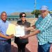 Gobernadora Nelsy Cruz realiza entrega cheque segunda partición malecón de Montecristi