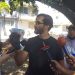Dirigentes del PLD y vehículos afectados por bombas lacrimógenas en protesta por operación Calamar