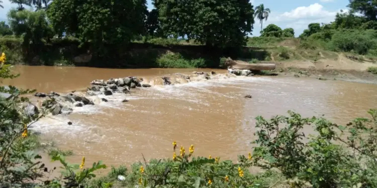 Encuentran cadáver de haitiano mutilado en río la Vigía