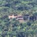 Denuncian construyen edificación en área protegida de Loma Isabel de Torres
