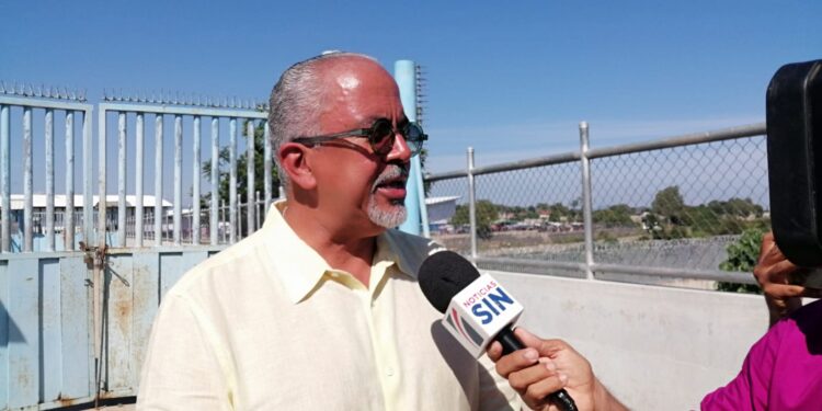 Ministro de industria y comercio  trata con autoridades de Dajabón y Haití abril pasarela del mercado