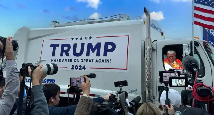 Donald Trump llega a mitin en un camión de Basura en respuesta a Joe Biden